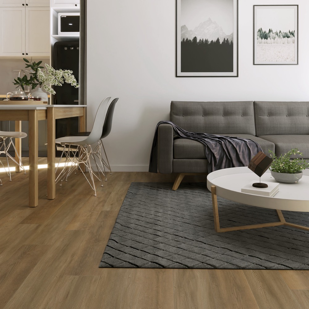 Newly installed wide plank flooring in an open-plan room